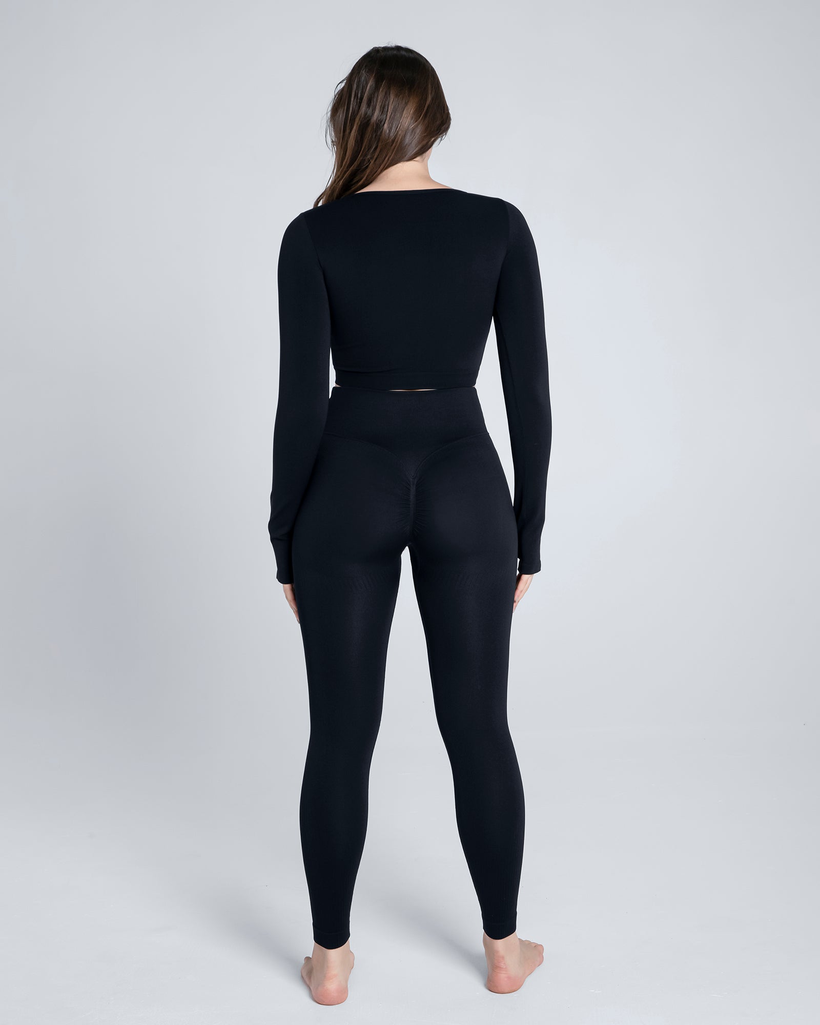Seamless Zipper Front Open Thumb Long Sleeve Jumpsuit in Black